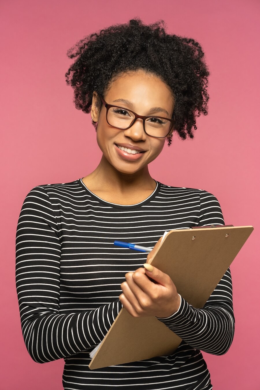 afro-american-teacher-woman-isolated-on-pink-studi-M2KPL2F